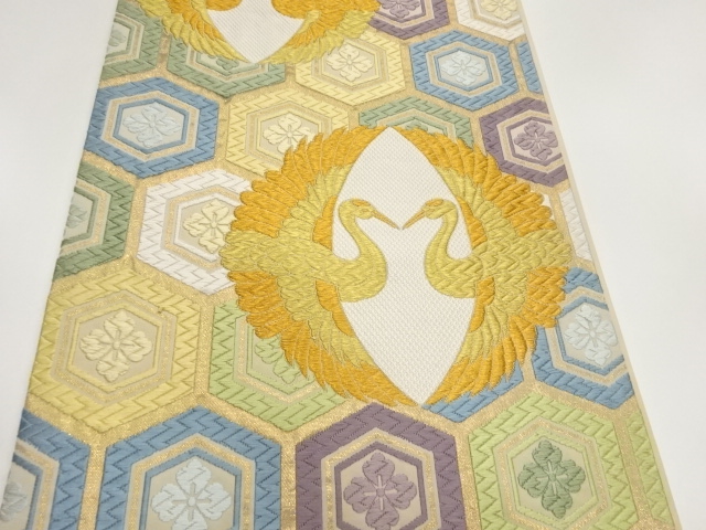  向かい鶴に亀甲・花菱模様織出し袋帯